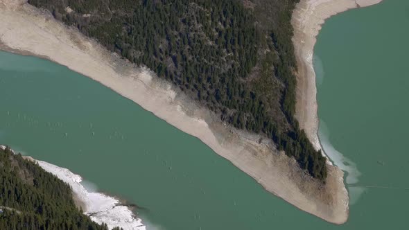 Top View Of A Dense Alpine Mountain Forest In Downton Lake, Canada. - Aerial Shot