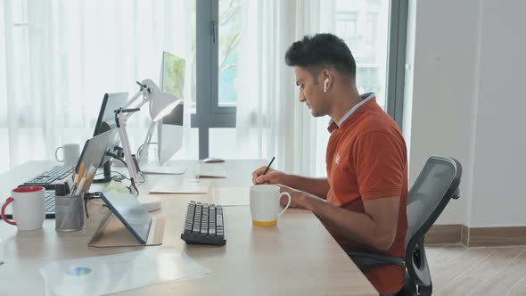 Indian Man Working in Office