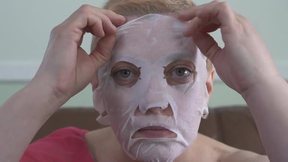 Portrait of Mature Woman in Facial Mask for Face