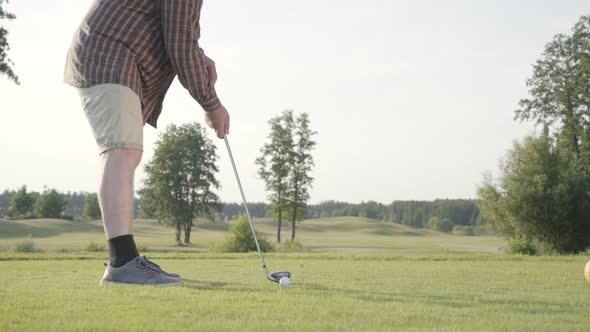 Unrecognized Man Playing Golf on the Golf Course