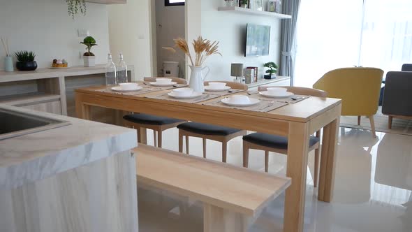 Minimal and Stylish Decorative Dining Area With Wooden Table and Chairs