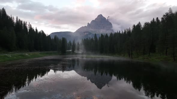 Mountain lake in the Dolomites with Tre Cime di Lavaredo reflection