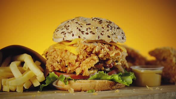 Crispy Chicken Burger with Cheddar Cheese Lettuce Tomato Onion