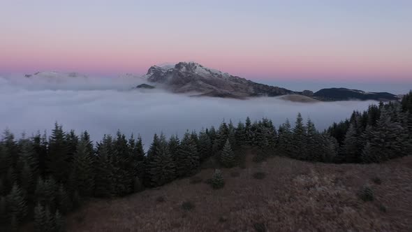 Spectacular Shooting Through The Clouds Over The Mountain