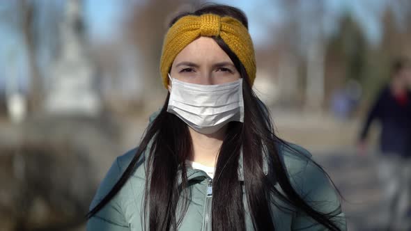 Woman Wearing Face Mask in the City