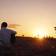 Alone Man Playing Guitar Outdoors at Sunset Time - VideoHive Item for Sale