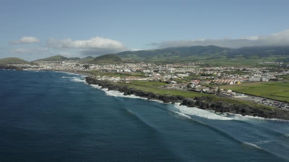 Aerial establishing shot of the Azores coastline