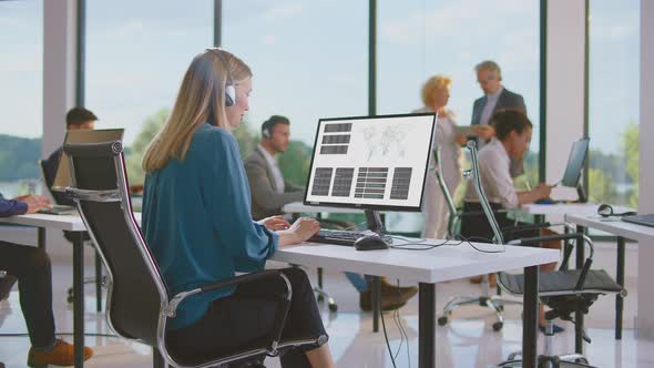 Woman looking for data in computer