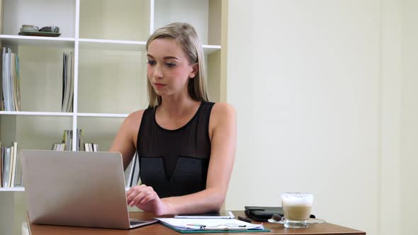 Blonde Business Woman Working at Modern Office