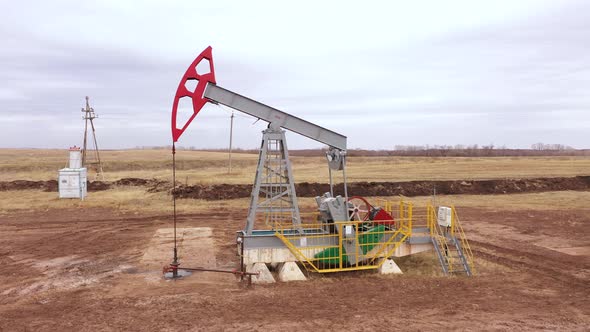 Pump Jack in Vast Oil Fields in Russia