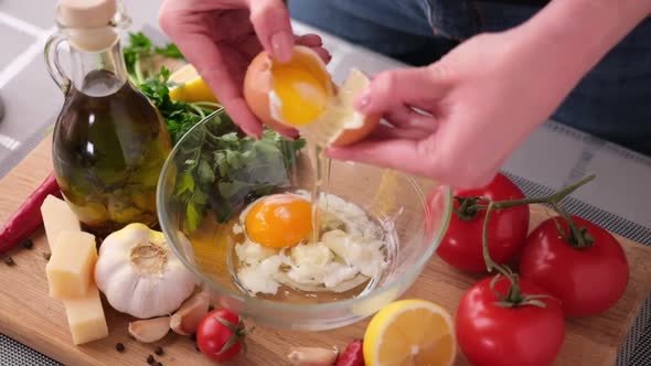 Making Caesar Salad Sauce  Beating Egg Yolk Into Glass Bowl Separates the Yolks From the Whites