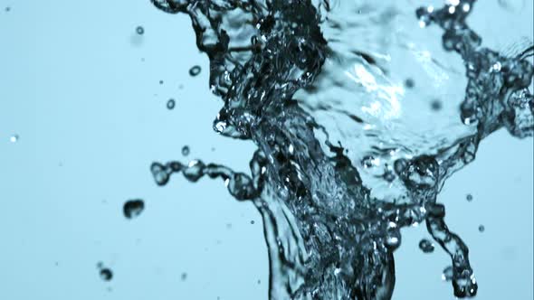 Water pouring and splashing in ultra slow motion 1500fps on a reflective surface - WATER POURS  alt