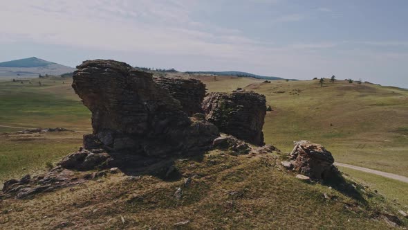 Baikal Valley spirits,Tazheran Steppe, Stone Cliffs on the Road. Aerial Summer