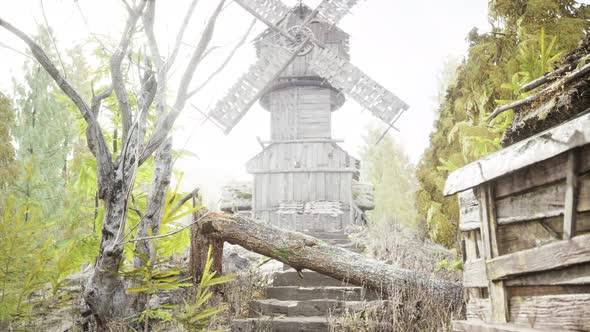 Old Traditional Wooden Windmill in the Forest