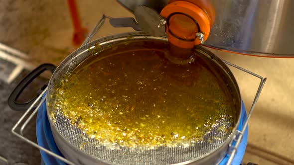 Honey in a Metal Tank Flows Through a Pipe