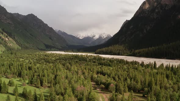 River and mountains with white clouds