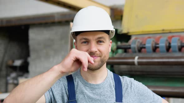 Portrait of a Professional Worker in an Industrial Workshop