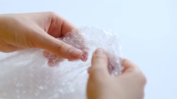 ASMR Woman Presses Plastic Bubble Wrap As a Stress Relief