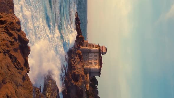 Vertical video of Castle near the stormy ocean