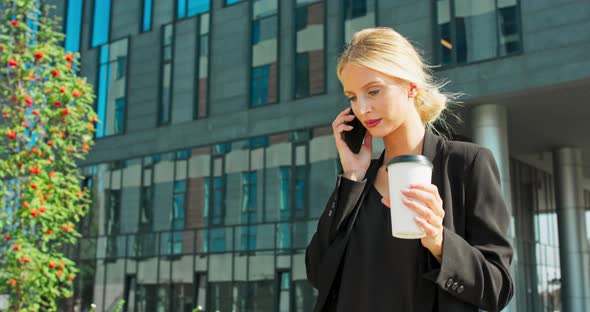 Business Woman Talking on Mobile Phone Young Modern Beautiful Woman Stylish Woman in a Dark