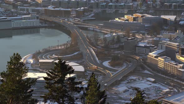 Slow zoom in shot over morning traffic in bergen city during winter season - Norway