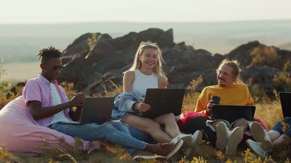 Office People Work in the Fresh Air and Communicate