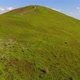 Aerial flight over green hill mountains. FPV Dynamic drone shot - VideoHive Item for Sale