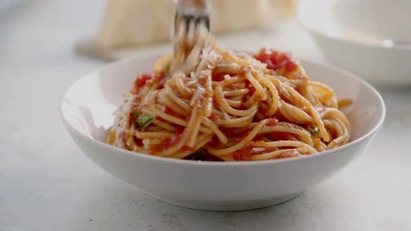 Spaghetti with Tomato Sauce and Basil on a Plate