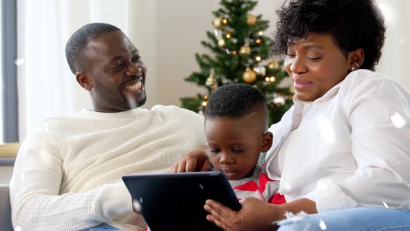 African Family with Tablet Pc on Christmas