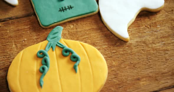 Gingerbread cookie and other sweet foods on a wooden table 4k