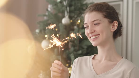 Woman Looking at Bengal Light Smiling