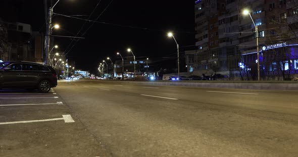 Vehicles Driving At Night In City Of Galati In Moldavia, Romania