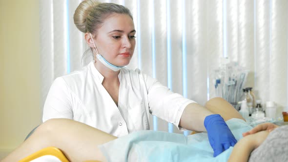 Patient and Doctor in the Gynecologist`s Office