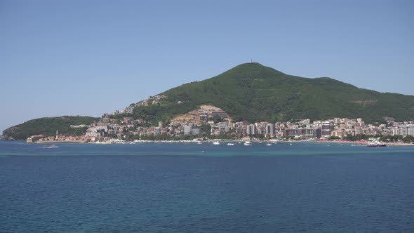 Boats Sail Off the Coast of Budva