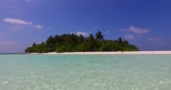 Wide angle above island view of a sunshine white sandy paradise beach and turquoise sea background i