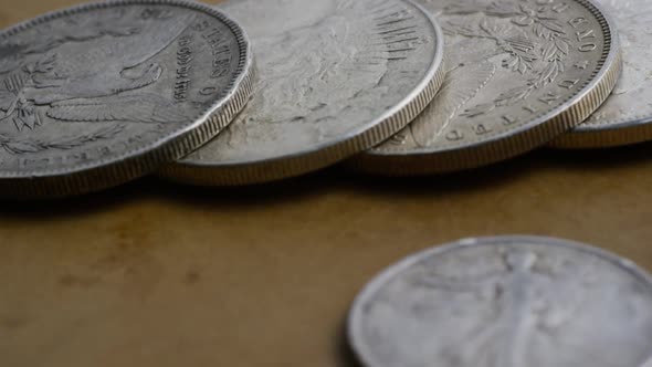 Rotating stock footage shot of antique American coins 