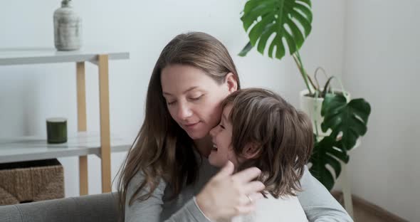 Closeup Worried Mom Hugging Taking Care Love and Support to Little Cute Boy Son Motherhood Feeling