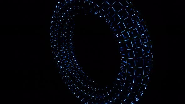 VJ Loop Rotation of an Abstract Torus Flashing with Multicolored Lights