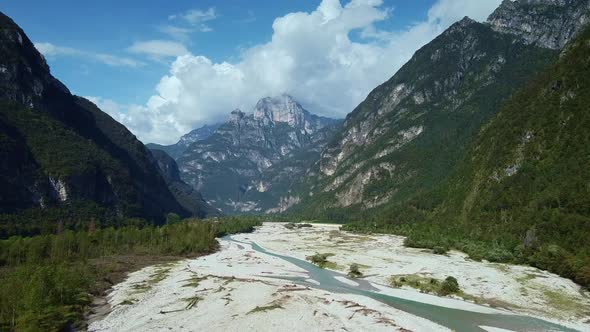 Aerial View of Valley with Italian Dolomites All Around