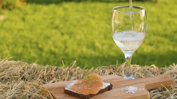 White Wine Pouring Into a Glass