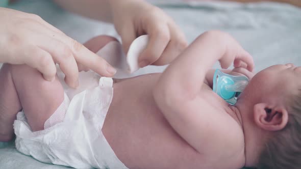 Careful Nurse Hands Treat Newborn Boy Umbilical Cord