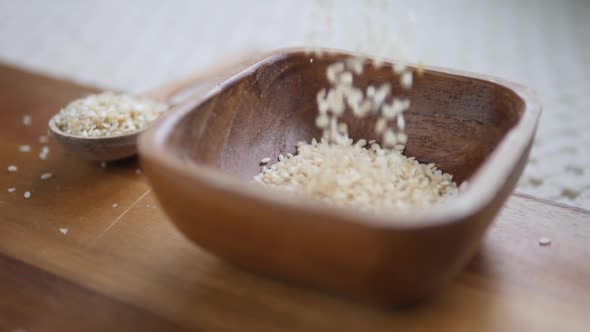 Healthy Food Concept. White Sesame In Wooden Bowl. Closeup.