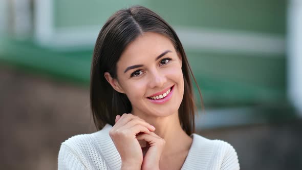 Closeup Happy Face of Brunette Woman Posing Outdoor at Countryside House