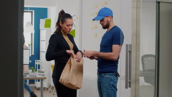 Entrepreneur Woman Working in Business Company Office Receiving Takeaway Food Lunch Box