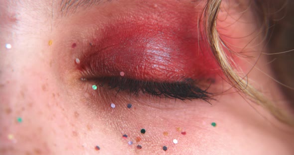 Close up of an eye full of glitter
