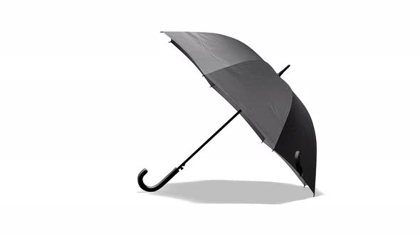 Blank black open umbrella lying, looped rotation
