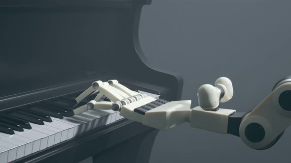 A modern robot is playing music on the piano. Fingers are moving with accuracy.