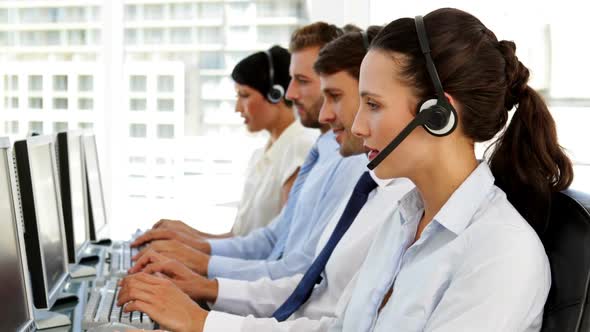 Happy Call Centre Agent Looking to Camera