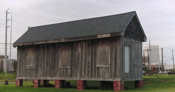 Low angle establishing shot of old house in Galveston, Texas