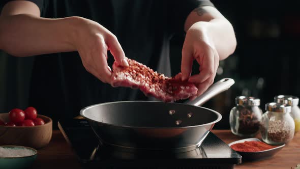 Chef Frying Ribs Closeup